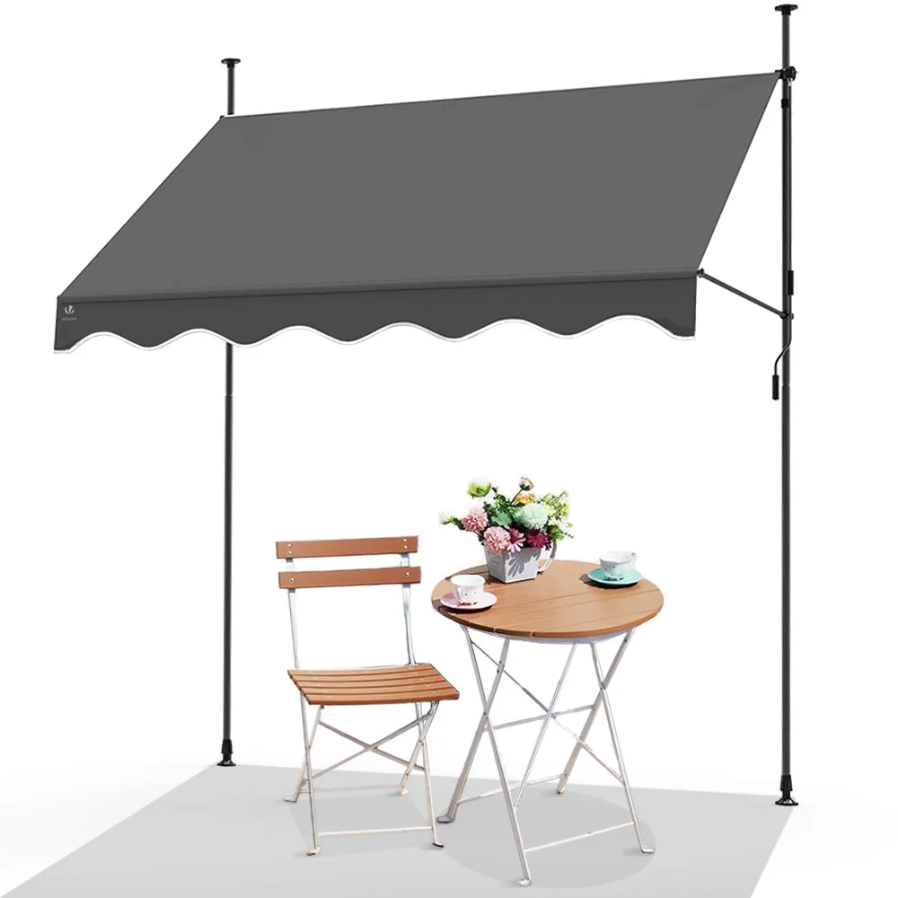 Store banne manuel Vounot gris pour créer de l'ombre devant une vitrine ou une terrasse